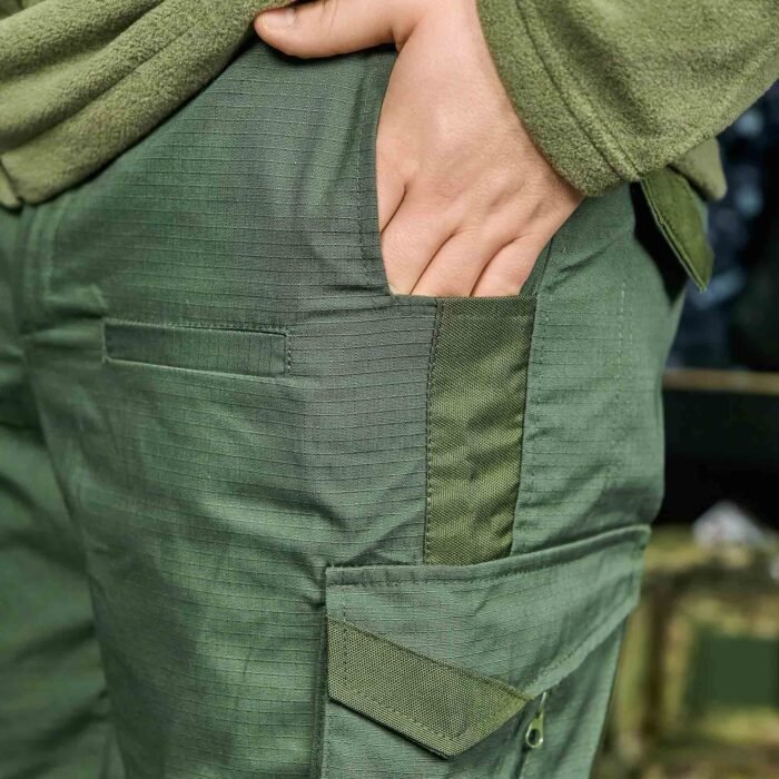 Close-up of Ukrainian Army tactical khaki pants pocket showcasing durable ripstop fabric.