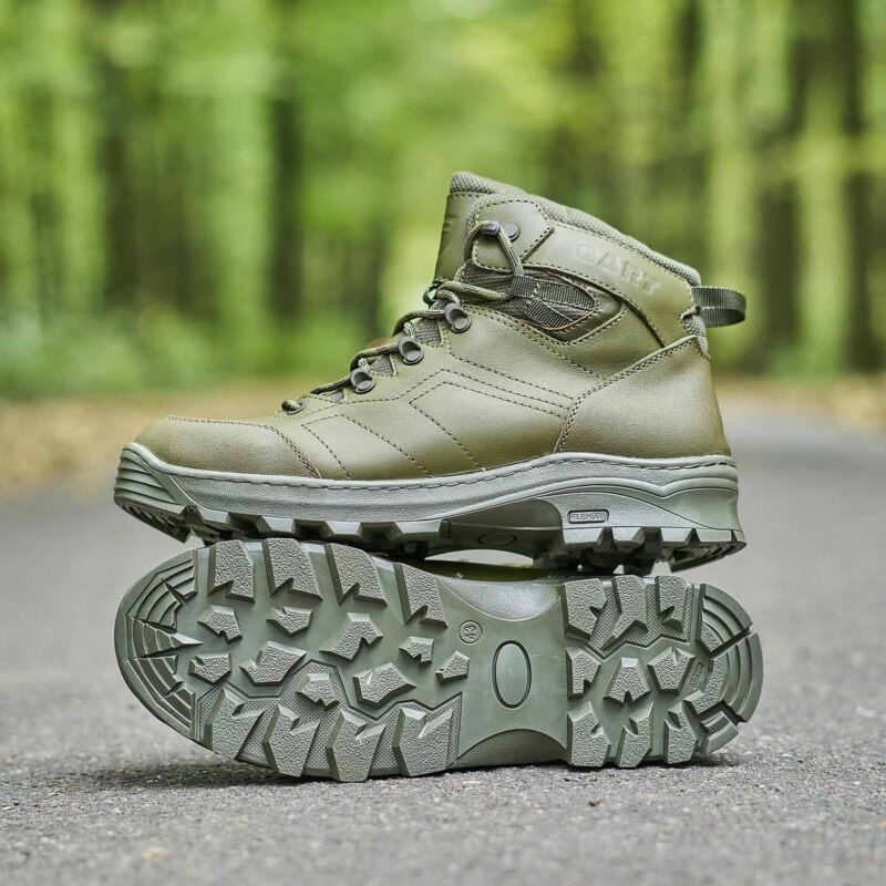 A full side view of an olive Temp tactical boot resting on another, showcasing its design and thick sole.