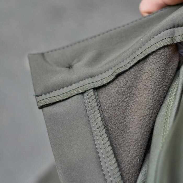 Close-up of Softshell fabric lining with fleece material for insulation.