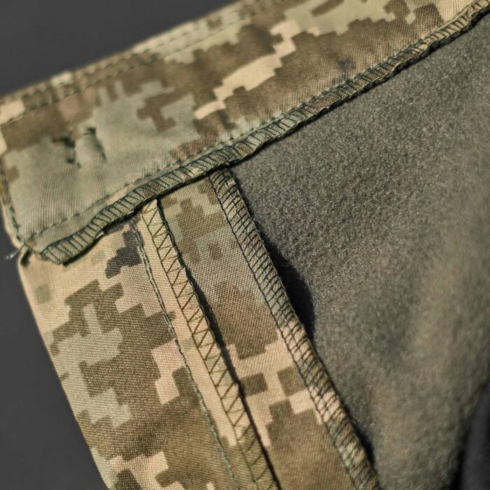 Fleece lining detail of fleece-lined pixel camo pants.