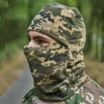 Front view of a winter fleece balaclava in pixel camouflage, perfect for airsoft, tactical use, and outdoor sports.