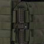 Fast release system on olive plate carrier