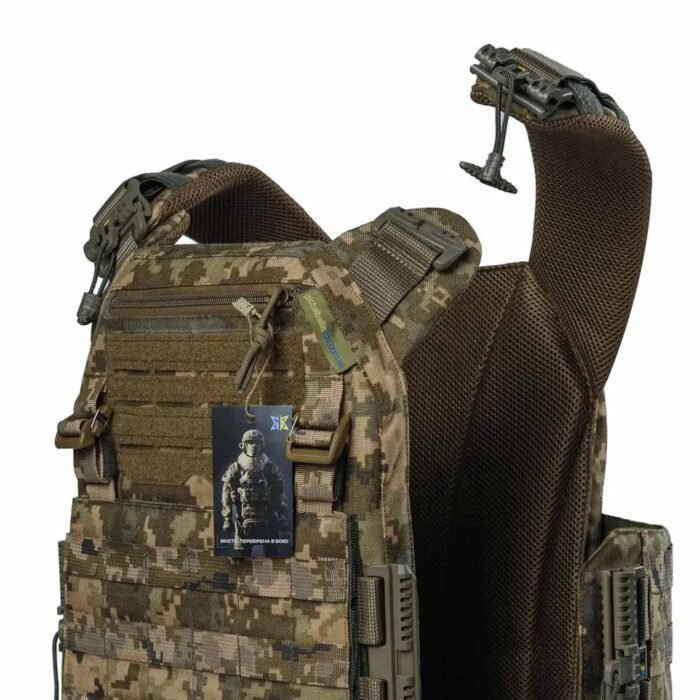 Detailed view of MOLLE system and Velcro patch area on military vest