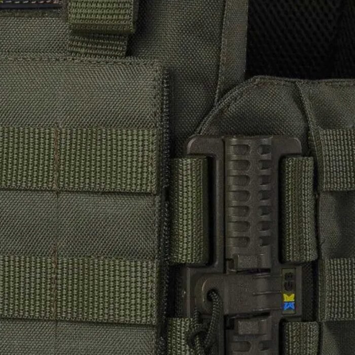 Tactical buckle system close-up on olive side panel