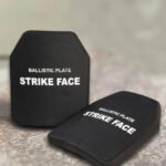 Tactical Level 6 ballistic armor plate with "Strike Face" label on the front