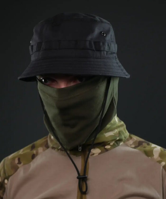 Lightweight black panama hat with chin strap, worn with tactical gear