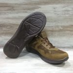 Underside view showing sole tread pattern of tactical mesh leather sneakers