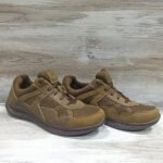 Front and side profile of tactical low-top sneakers with mesh panels and leather overlays