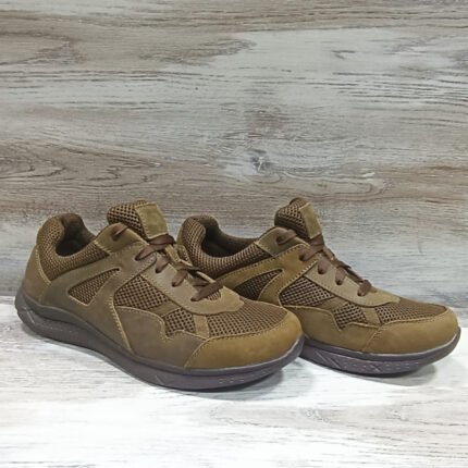 Front and side profile of tactical low-top sneakers with mesh panels and leather overlays