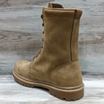 Close-up of stitching and leather texture on NATO beige combat boot