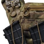 Close-up of multicam tactical vest quick release buckle and admin pocket