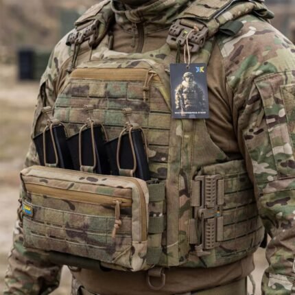 Front view of multicam tactical plate carrier vest with admin pouch, triple mag pouch setup, and MOLLE system